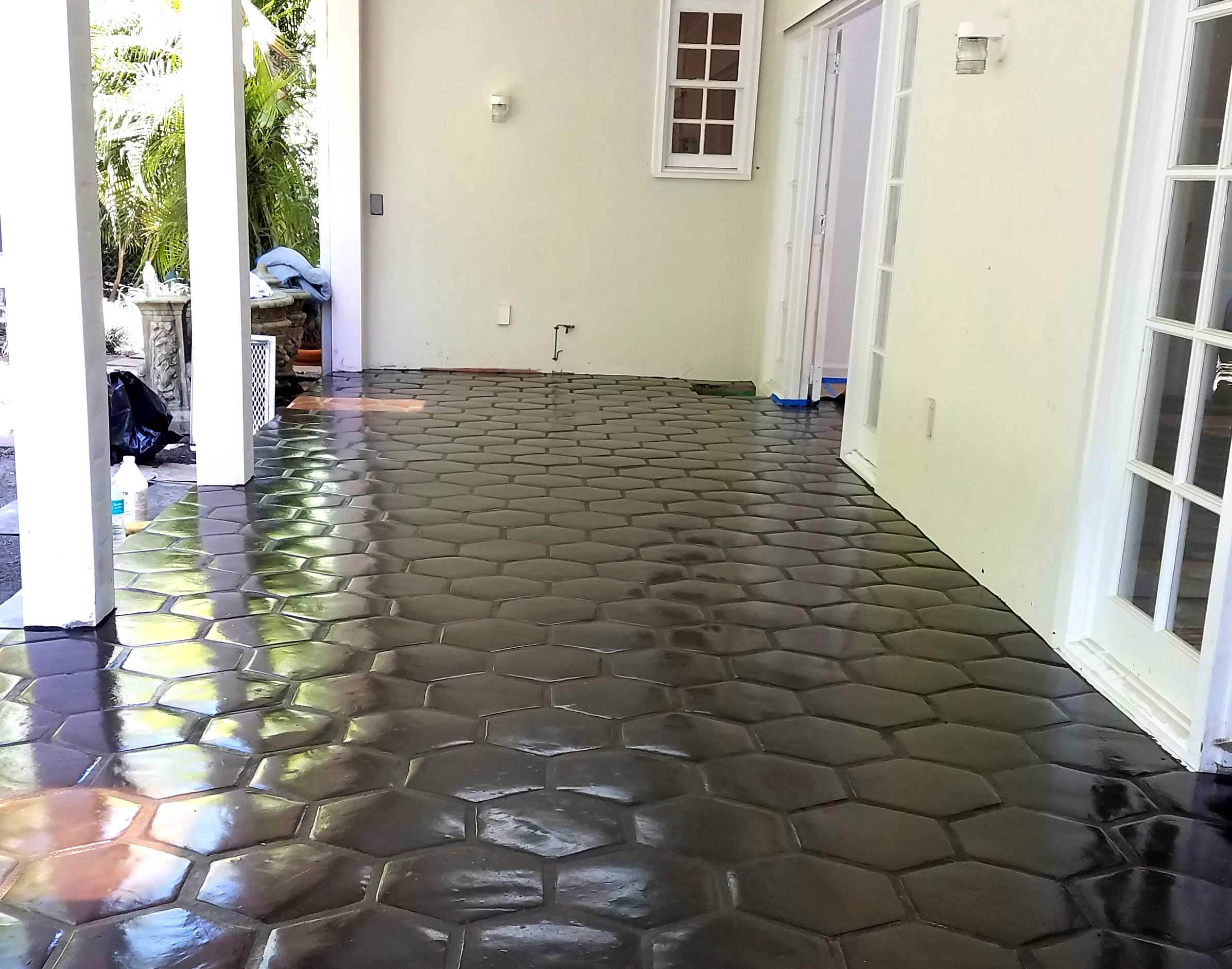 Photo of Mexican tile dark stain on Miami patio